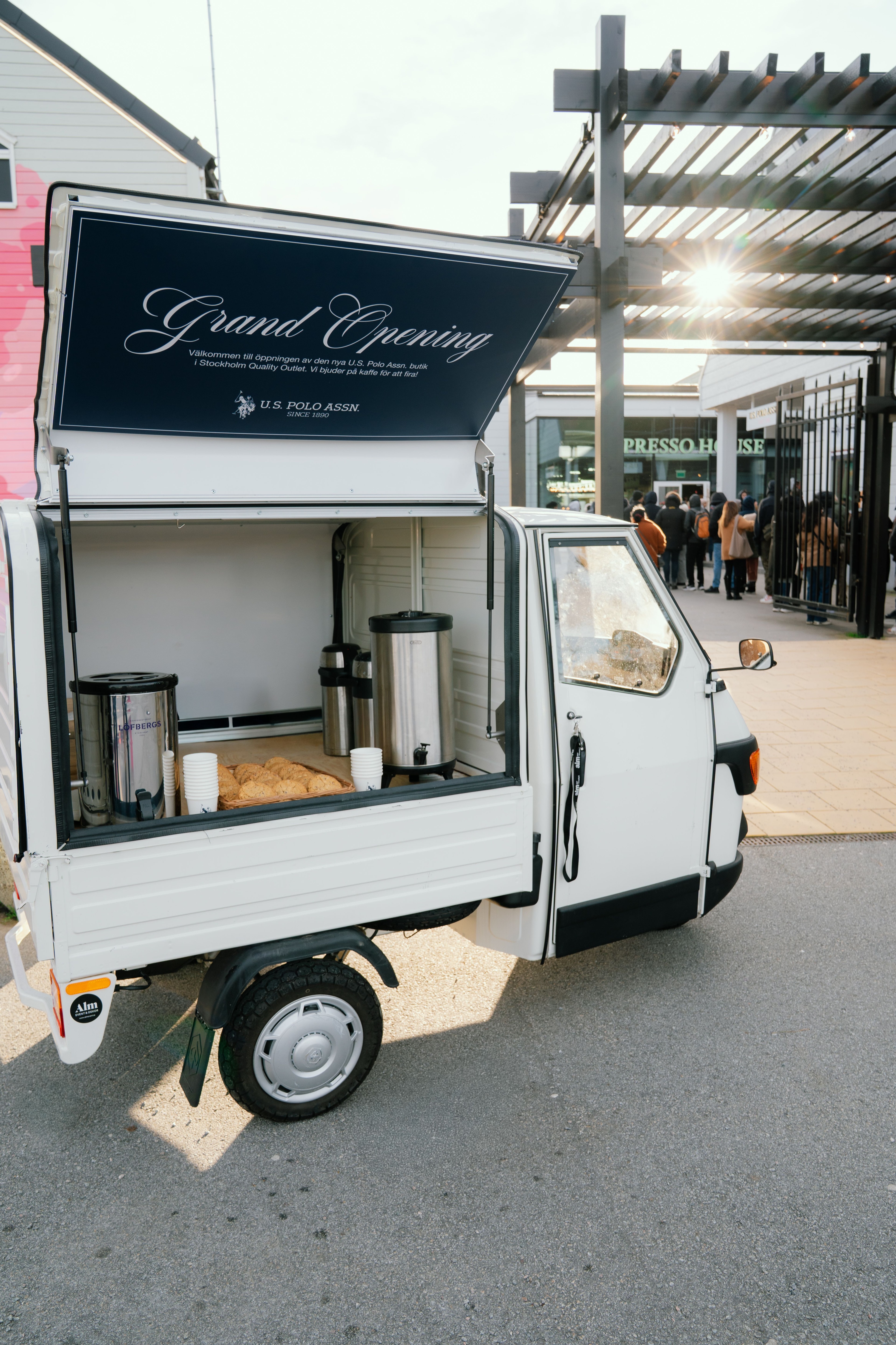 Grand Opening coffee cart outside the store