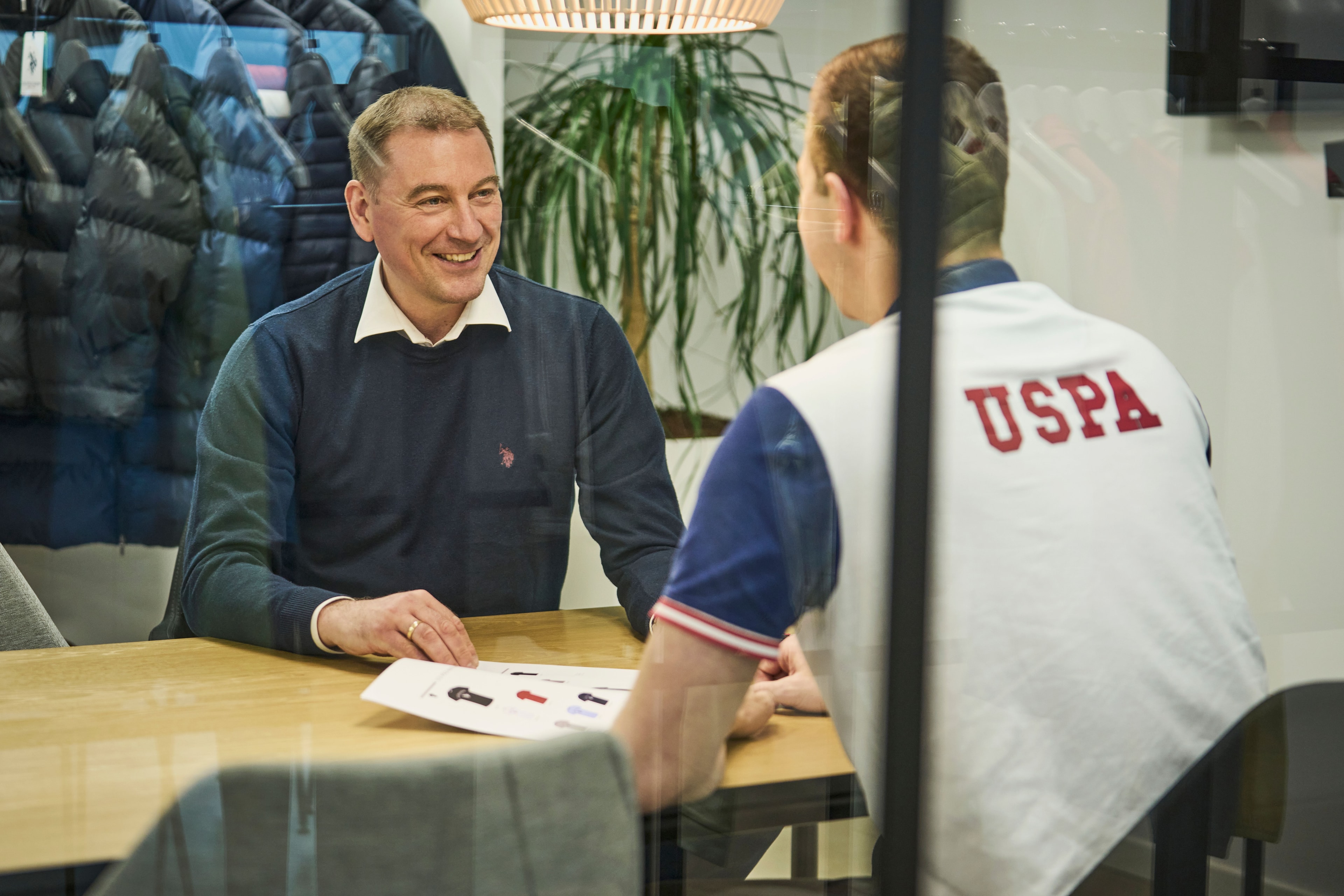 A STARTEX colleague meeting with a U.S. Polo Assn. representative